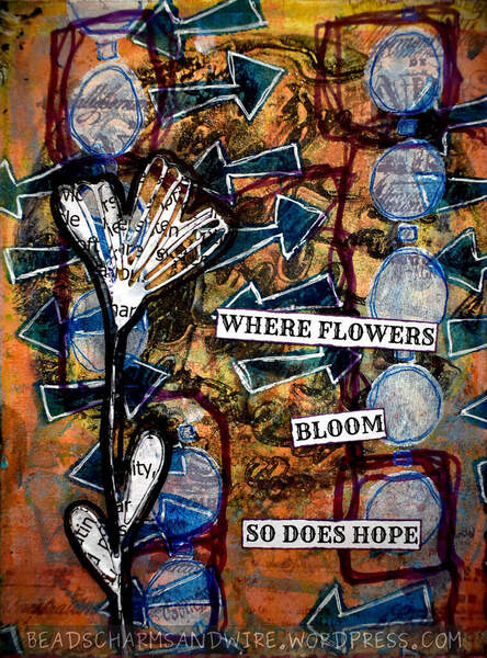 Art journal page with outlined, die-cut flower on gel-printed and stenciled background