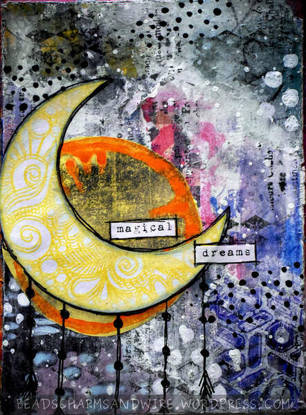 An art journal page with a grungy, scrappy background in white, gray, and blue, with a lot of black and white marks on it. A patterned yellow moon is in the foreground over a stamped yellow, orange, and black disc.