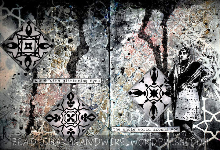 A mostly-monochrome art journal spread over 2 pages. The background is textured, with areas of tactile and visual textures from different stencils. Splatters and drips are interspersed between three diamond-shaped monochrome motifs with patterns within them. A monochrome girl standing in the lower right area of the spread appears to be resting her elbow on one of the diamond motifs.